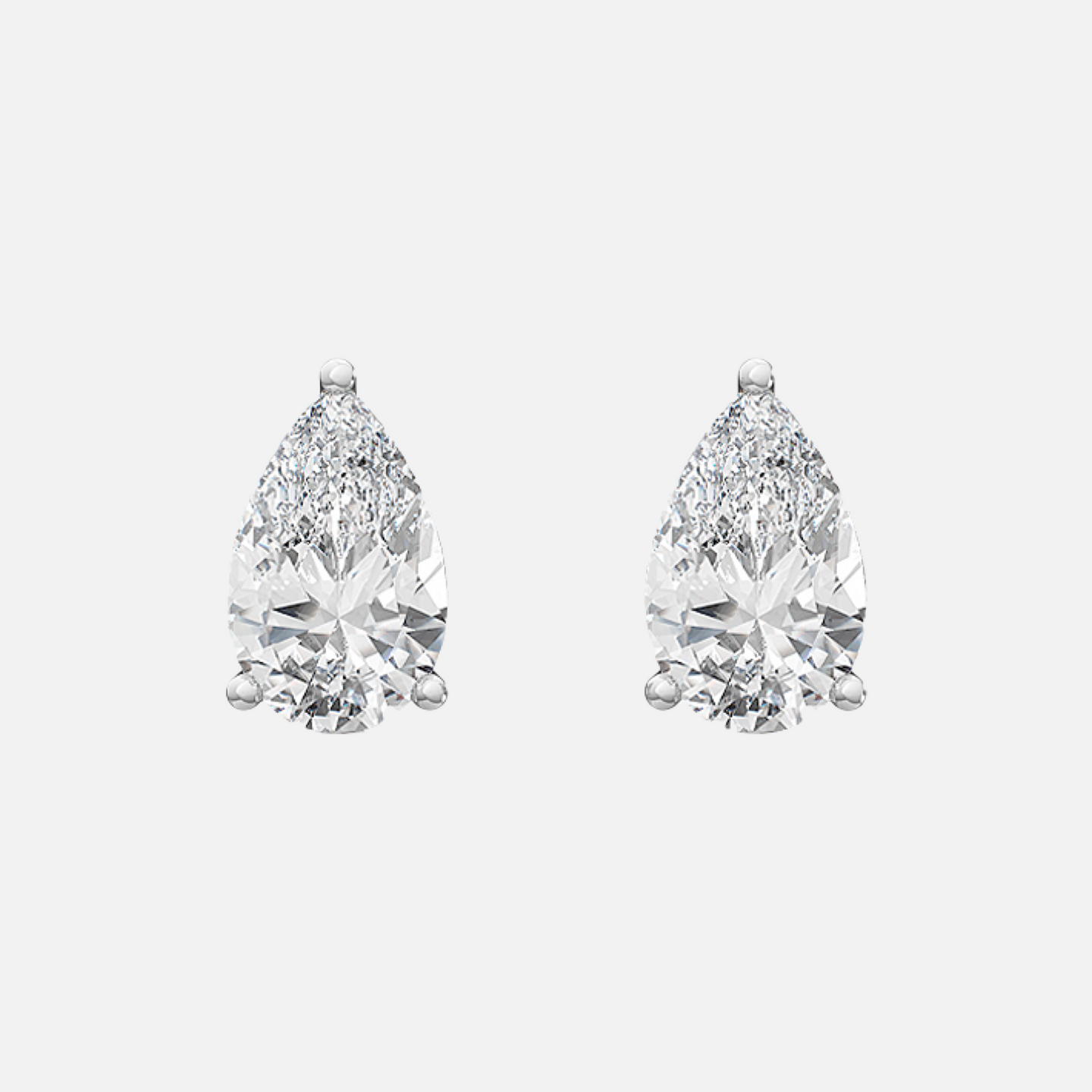 18K white Gold Pear Solitaire Earrings